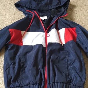 Blue, red, and white wind breaker jacket.